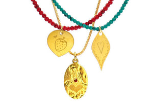 A combo of 3 different necklaces with germstones, silver 925 gold plated chain, combined with silver 925 gold plated charms with different desings - strawberry, long heart, burning heart with zircon strass-.