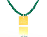 Load image into Gallery viewer, A necklace made of green emerald crystal beads and a squared silver 925 charm plated in gold 24K, with a message ´´όλα λάθος&#39;&#39; -&#39;It&#39;s all wrong! ..
