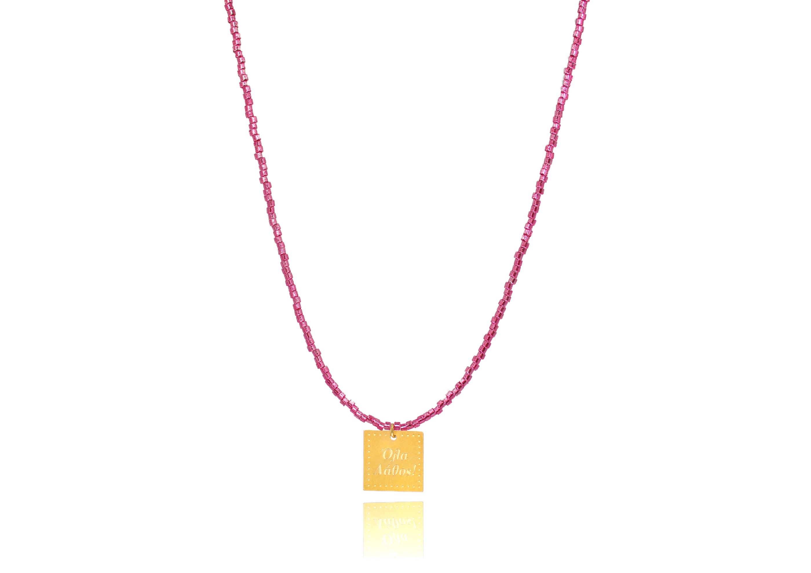 A necklace made of fucshia japanese miyuki beads and a squared silver 925 charm plated in gold 24K, with a message´´όλα λάθος'' -'It's all wrong! .