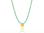 Load image into Gallery viewer, A necklace made of forest green japanese miyuki beads and a squared silver 925 charm plated in gold 24K, with a message ´´όλα λάθος&#39;&#39; -&#39;It&#39;s all wrong! .
