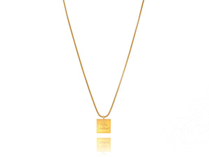 A necklace made of silver 925 gold plated chain and a squared silver 925 charm plated in gold 24K, with a message ´´όλα λάθος'' -'It's all wrong! .